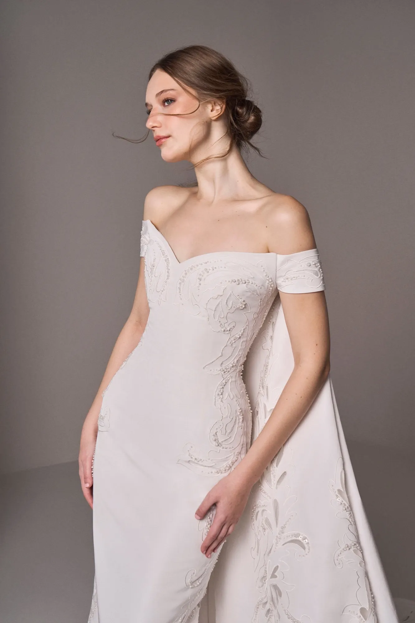 Bridal gown with a sculpted train