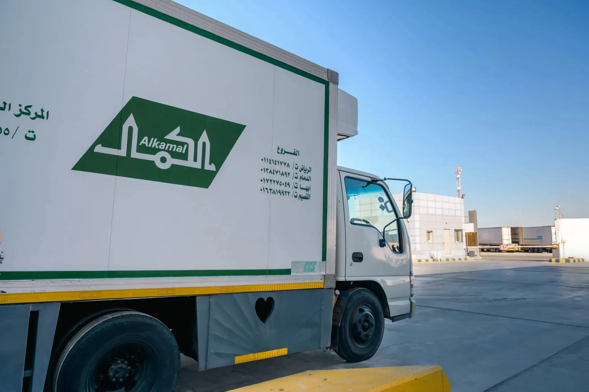 Al Kamal delivery truck in the yard