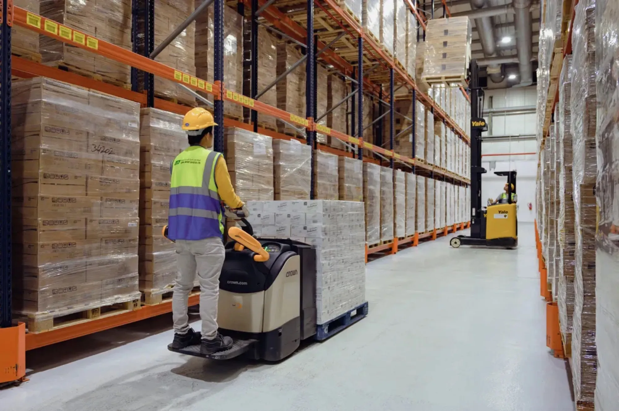 Warehouse operator moving a pallet